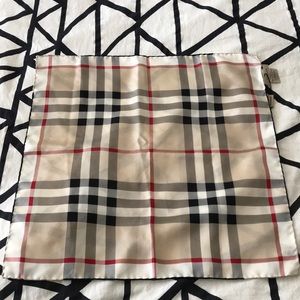 Women’s  Burberry scarf.